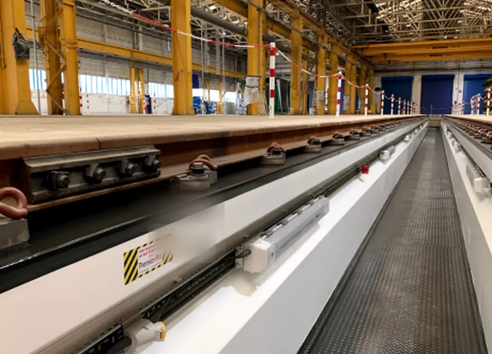 Sistema de movimentação industrial sobre trilhos